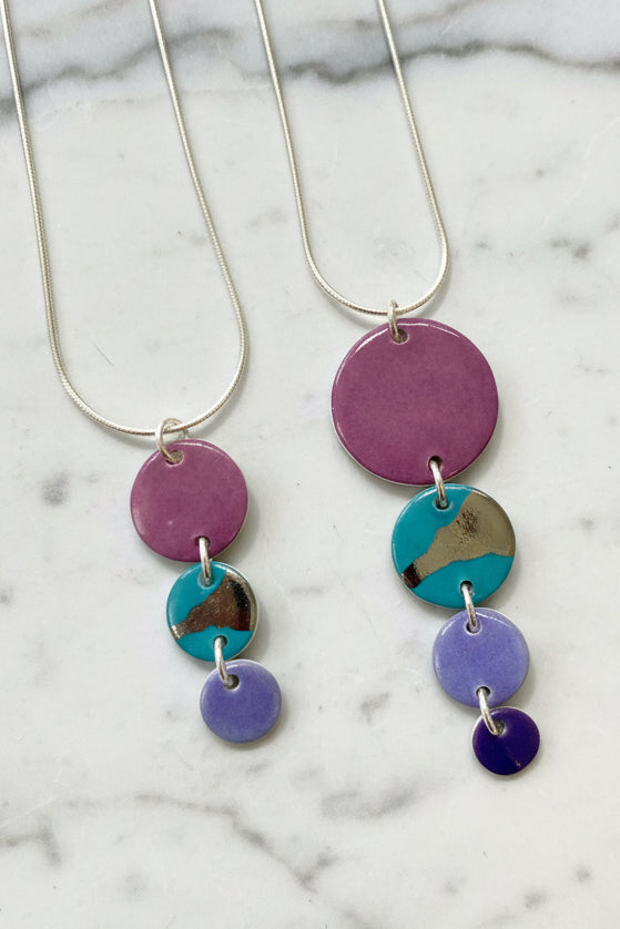 Disc Necklace with Platinum Detailing (4 Discs)