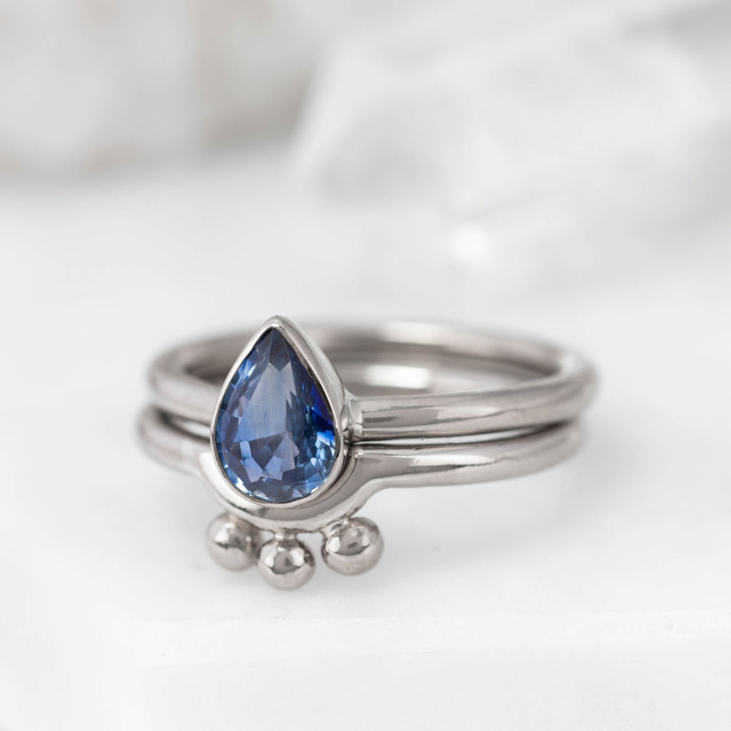 White Gold and Pear Sapphire Nestle Ring