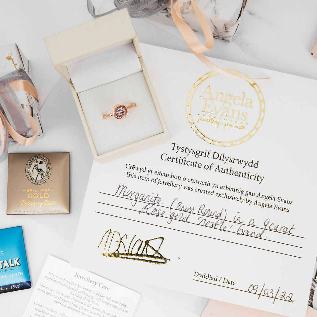 Rose Gold with three Diamonds Nestling Wedding Ring