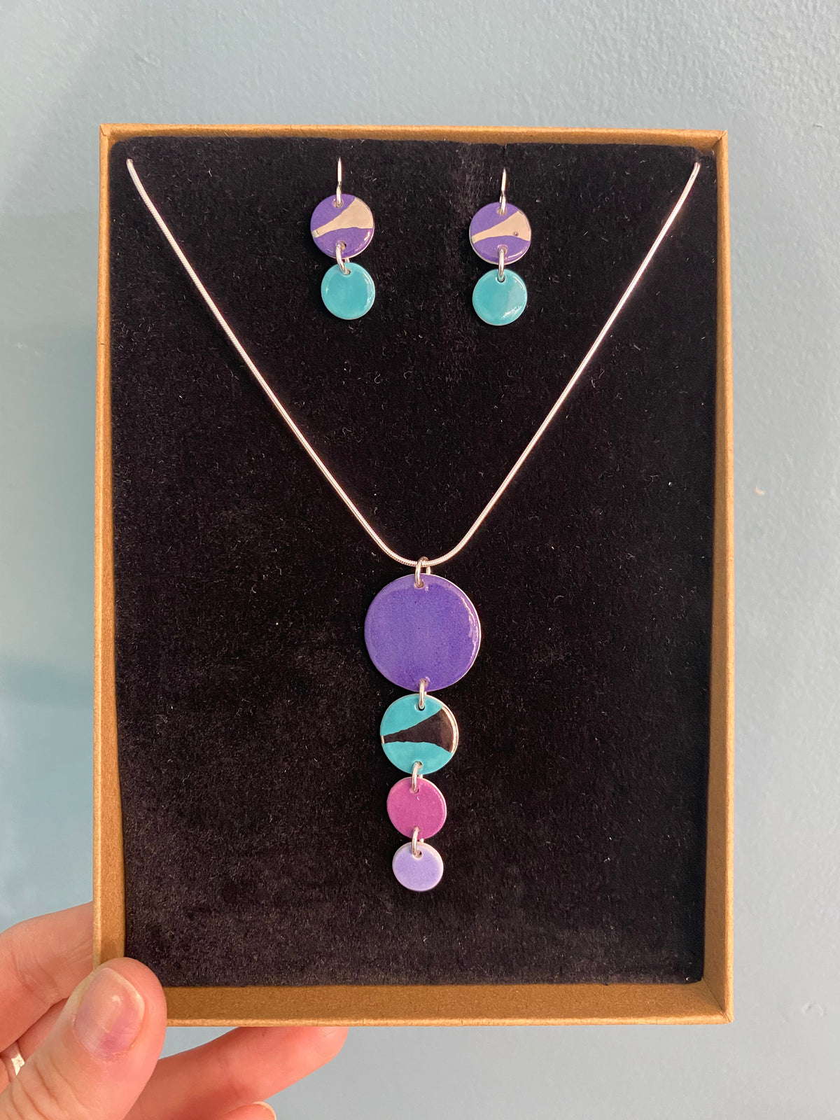 Disc Necklace with Platinum Detailing (4 Discs)