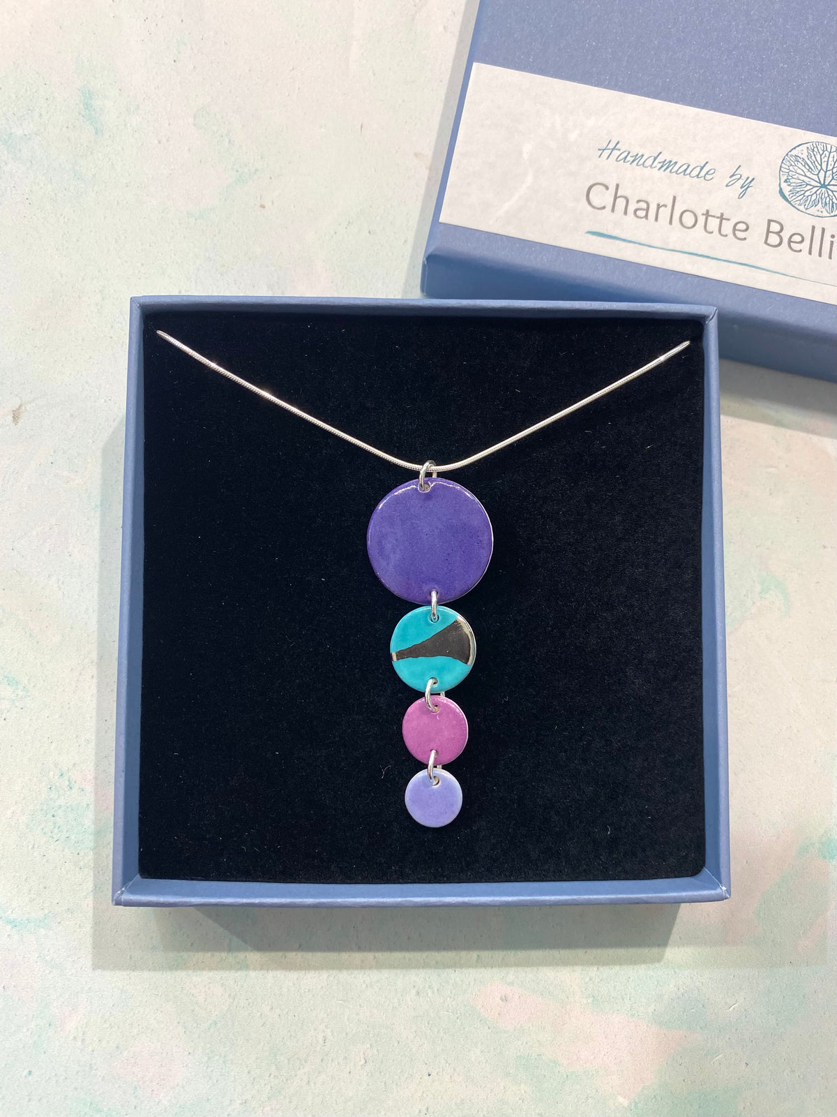 Disc Necklace with Platinum Detailing (4 Discs)
