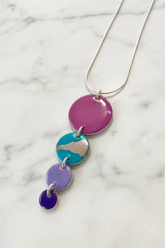 Disc Necklace with Platinum Detailing (4 Discs)