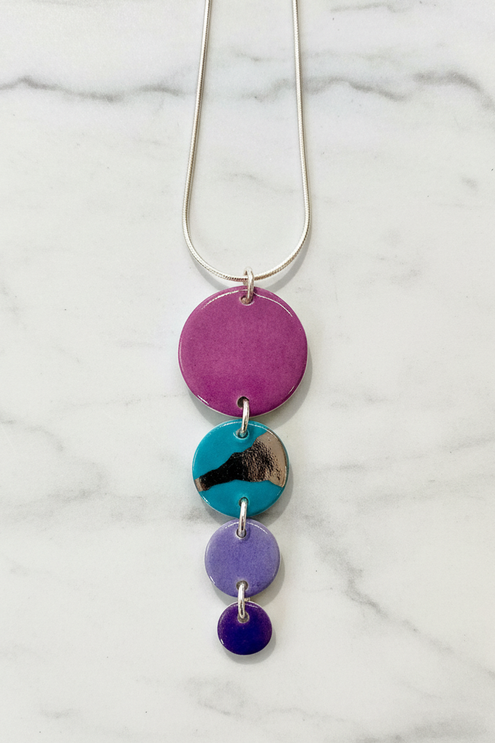 Disc Necklace with Platinum Detailing (4 Discs)