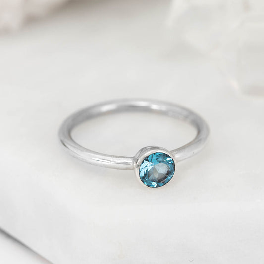 Silver with Swiss Blue Topaz Nestle Ring