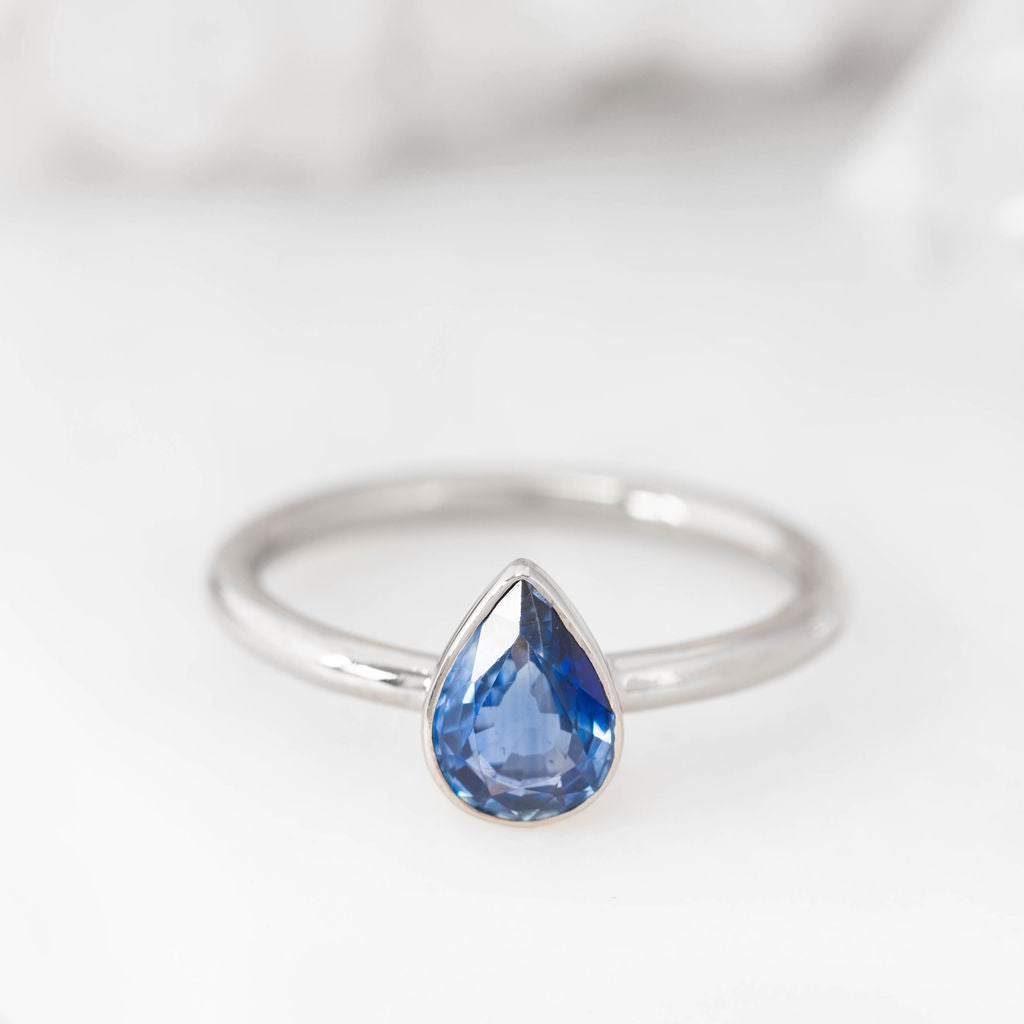 White Gold and Pear Sapphire Nestle Ring