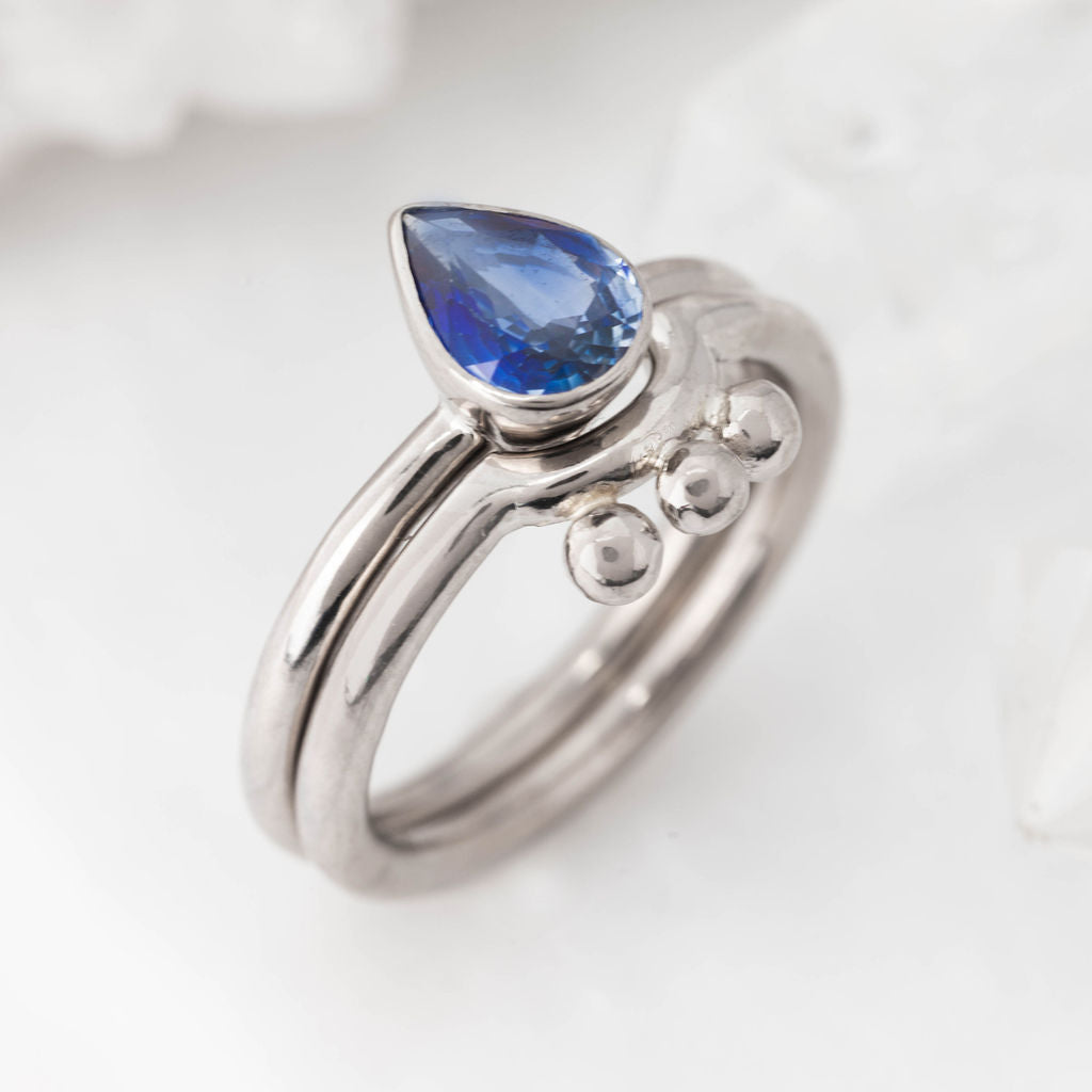 White Gold and Pear Sapphire Nestle Ring