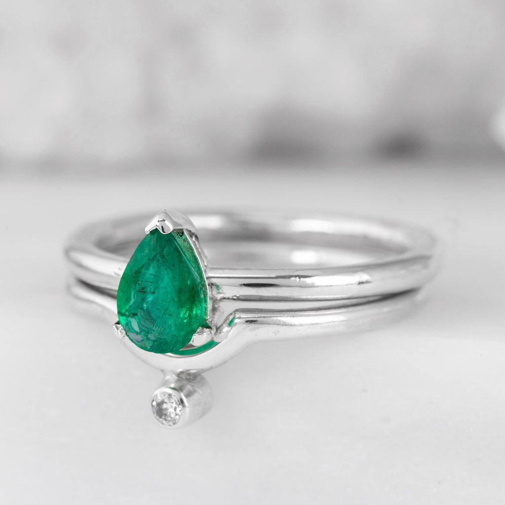 Platinum with Pear Emerald Nestle Ring